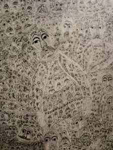 Kartka papieru całkowicie zarysowana uproszczonymi postaciami i męskimi głowami z wąsami