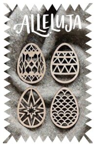 Okolicznościowa grafika wielkanocna z czterema formami ze sklejki w kształcie jajek z wyciętymi geometrycznymi wzorami a całość ułożona na szarym płótnie